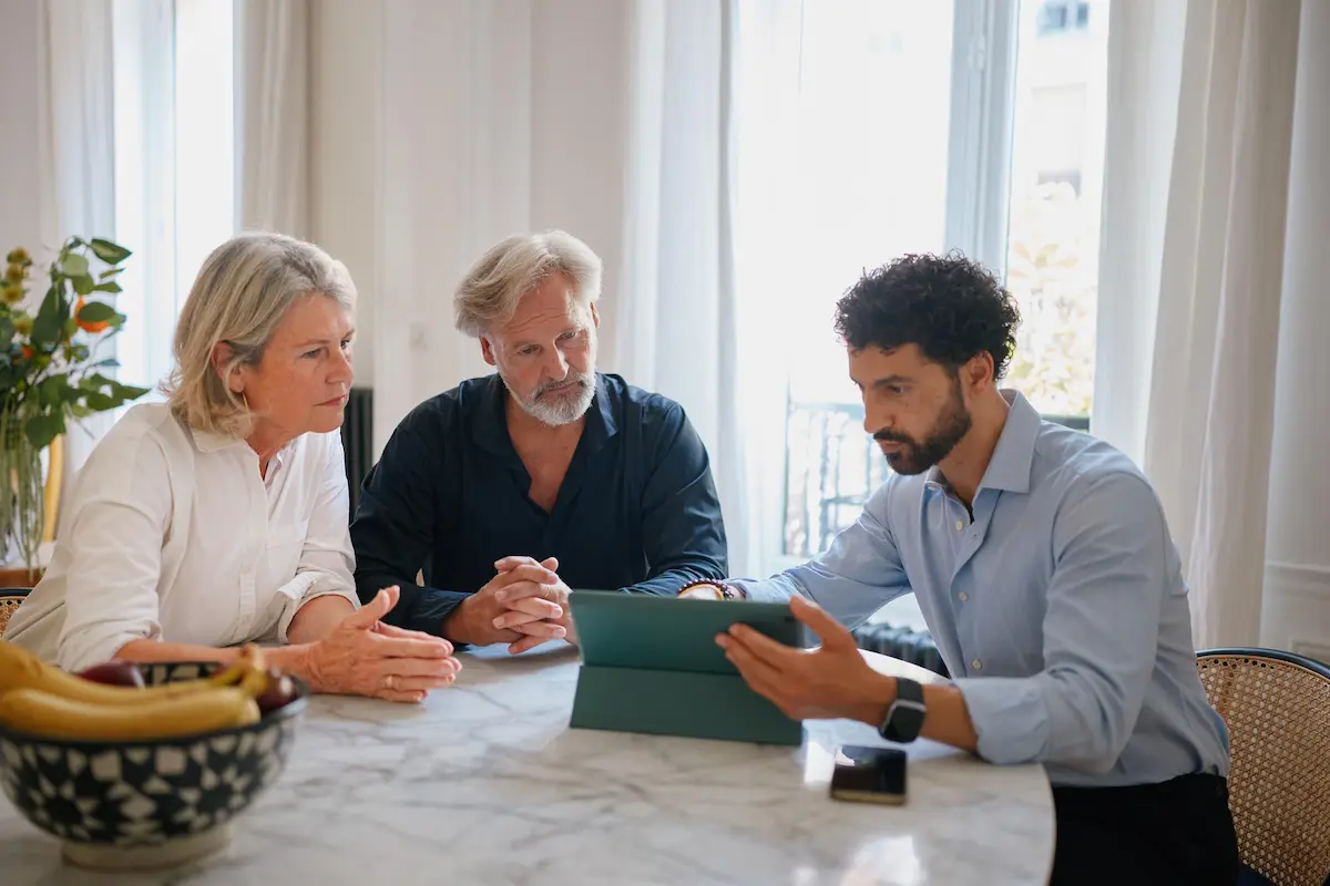 Older homeowner reviewing reverse mortgage options with a trusted mortgage professional